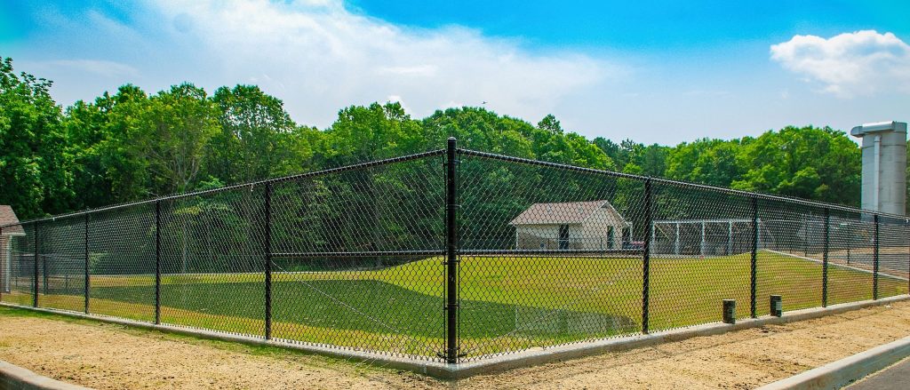 Best Fence Types for Windy or Storm-Prone Areas: A Complete Guide for Homeowners