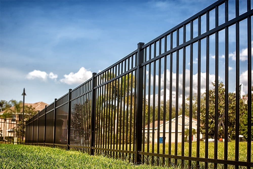 Best Fence Types for Windy or Storm-Prone Areas: A Complete Guide for Homeowners